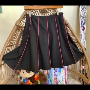 An INC black/red pleated skirt